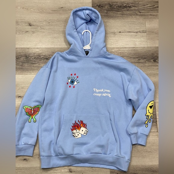 Forever 21 Tops - Sparkly glitter tattoo graphics hoodie Size: Large Color: Baby Blue EUC